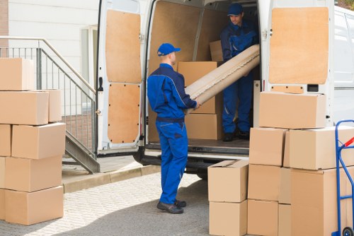 Man with a van helping with a move in Westminster street