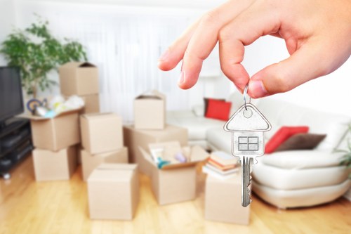 Professional movers loading items for a Westminster house removal