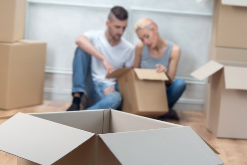 Packed household boxes and furniture ready for a Westminster relocation