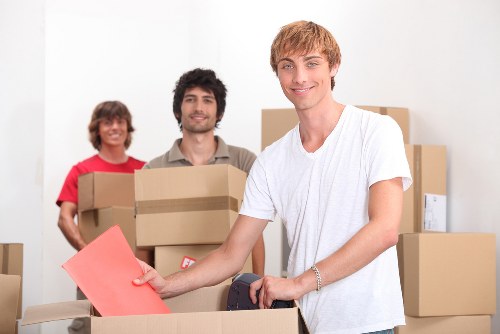 Van removal team planning a move around Westminster apartment access